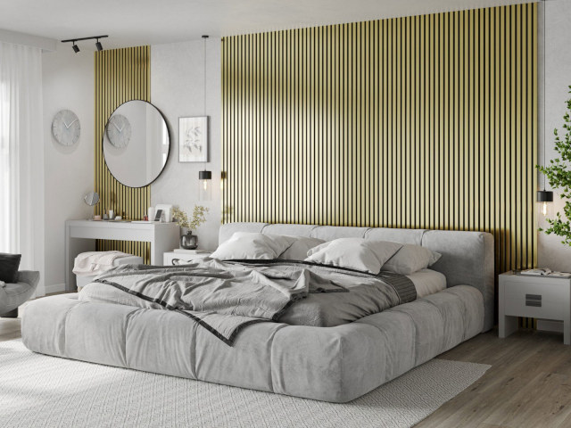 Kultaiset seinälamellit makuuhuoneessa