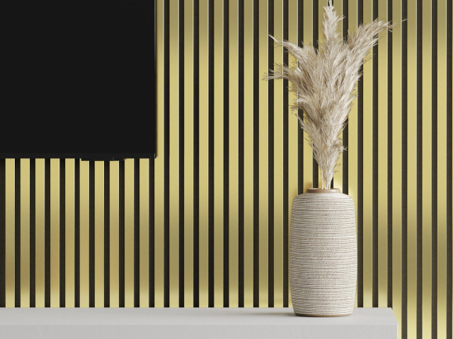 Kultaiset lamellit tilassa